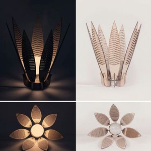 May include: Four different views of a wooden lamp with a unique design. The lamp is made of thin, laser-cut wood pieces that resemble leaves. The lamp is lit in the first and fourth images, showing the light shining through the wood.