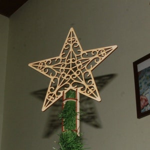 Estrela cortada a laser na árvore de Natal Ano Novo.Vetor dxf, cdr,svg para CNC, arquivo vetorial, arte vetorial digital, cnc, arquivo cnc, padrão cnc, corte cnc.
