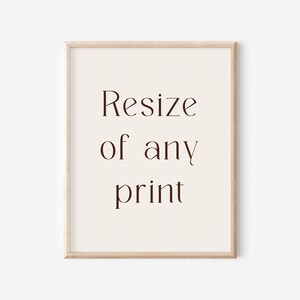 May include: A framed print with the text "Resize of any print" in brown lettering on a cream background.