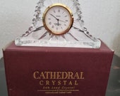 vintage Cathedral Crystal battery-operated mantle clock. boxed. 10.5 x 6.5 x 2.6 cms.