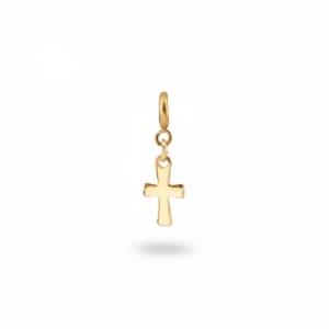 May include: A small, polished gold-tone cross charm suspended from a circular jump ring. The cross features smooth, rounded edges and a simple, clean design, reflecting light across its metallic surface against a plain, neutral background.