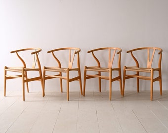 Ensemble de 4 Hans J. Wegner 'The Y Chair' avec coussins en cuir CH24