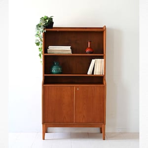 1950s Scandinavian Teak Bookcase with Hinged Doors – Vintage Mid-Century Shelving Unit