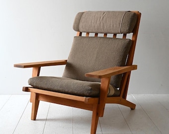 Sillón GE 375 con otomana de Hans Wegner para Getama, sillón danés de roble de los años 50.