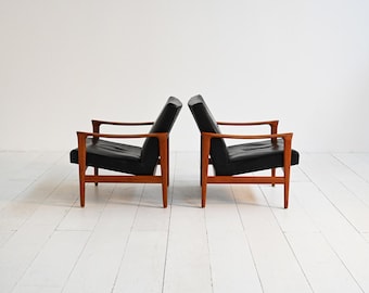 Paar "Oslo" fauteuils van Inge Andersson voor Bröderna Anderssons, Teakhouten loungestoelen uit de jaren 60, zwart leer, Scandinavisch modern