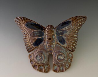 Wall hanging ceramic butterfly. Can be hung indoors and outdoors