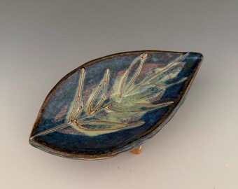 Handmade soap/jewelry dish with feet. 4.5” wide by 7” long.
