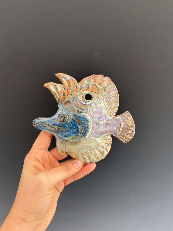 Medium handmade ceramic sea turtle wall hanging. (Boysenberry Glaze