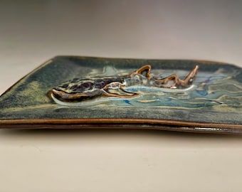 Handmade serving tray with slip trail details and hand built whale shark.  Microwave/Oven/Dishwasher safe.