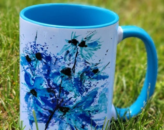 15 oz. Blue Handled Mug - Blue Splatter Flowers By Ian M. - Supporting Artisans with Barriers