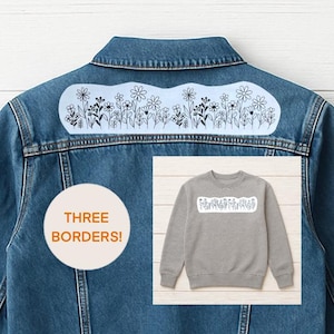 May include: A denim jacket with a light blue floral design on the back. A grey sweatshirt with a matching floral design is shown in the corner. The image includes a white circle with the text "THREE BORDERS!"