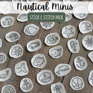 May include: A collection of white fabric stick and stitch embroidery patches featuring black line art illustrations of nautical themes including seashells, fish, anchors, a lighthouse, a ship wheel, a whale, a dolphin, and a captain's hat.