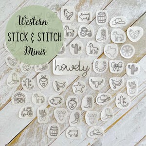 May include: A collection of Western-themed stick and stitch mini embroidery patches. The patches feature various designs, including a cowboy hat, cactus, horseshoe, and the word "howdy". The patches are on a light-colored background.