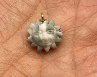 Hand made ceramic charm.  Sun. ( 2 pieces per price)