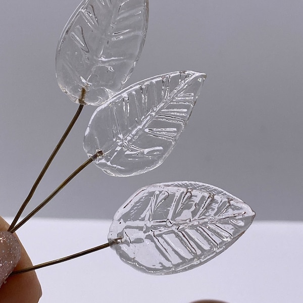 Large pressed glass leaf with fused wire/eye pin. 30mm. Clear (10 pieces per price)