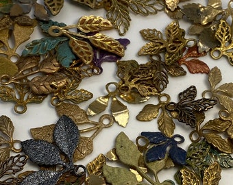 Mixed lot of painted brass (3)leaf components from Colleen Toland Studios. (40 pieces per price)