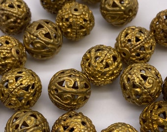 Vintage brass filigree round beads. ( 20 peices per price)