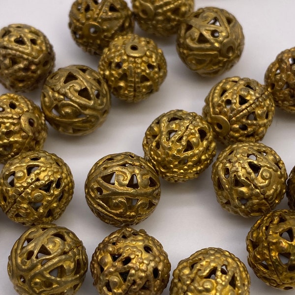 Vintage brass filigree round beads. ( 20 peices per price)