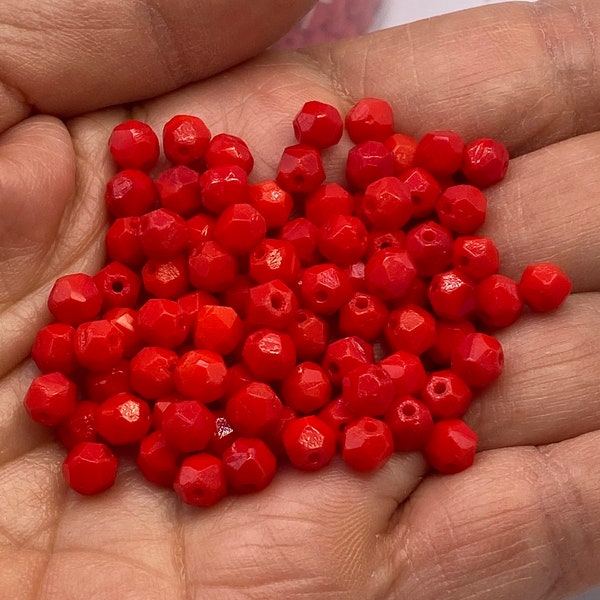 Bright red opaque facetted glass beads. 5mm ( 50 peices per price)