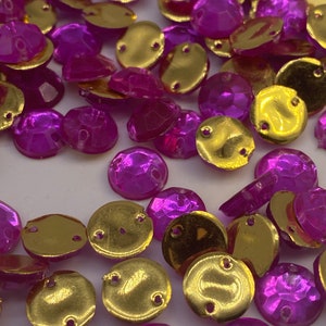 Facetted round cabochon style beads.  Fuchsia  ( 100 pieces per price)