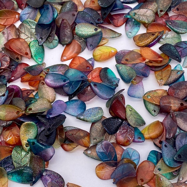 Small hand painted leaf/tear drops from our studio. 13mm. Mixed Multi-toned iridescent. (50 pieces per price)