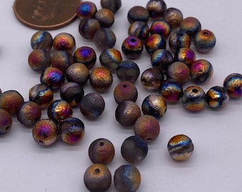Vidrio redondo grabado mate en bronce y oro con acabado AB arcoíris. 6mm (60 piezas por precio)
