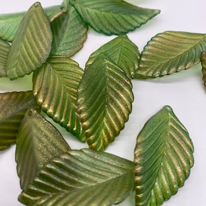 Large hand painted leaf bead.  Green and gold tones. Acrylic 39mm (12 peices per price)