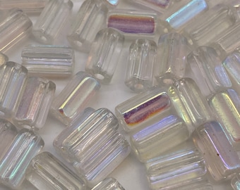 Clear rectangular glass beads with iridescent finish. (30 pieces per price)