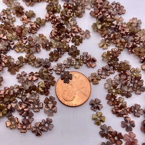 Mixed lot of hand painted tiny flower beads from our studio. Gold Tones.(200 pieces per price)