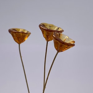 Hand made glass flowers with fused brass wire eye pin. 10mm. Topaz. ( 20 pieces per price)