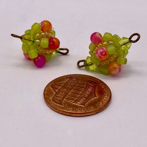 Hand made beaded double loop accent bead. 16mm Acrylic (2 per price) Lime/Pink.