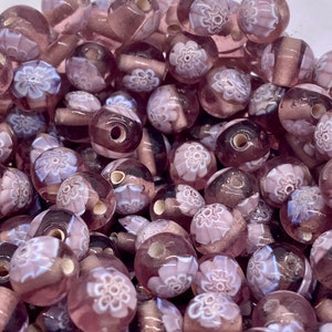 Beautiful Millefiori glass bead.  Pink/ Mauve. 10mm. ( 30 pieces per price)