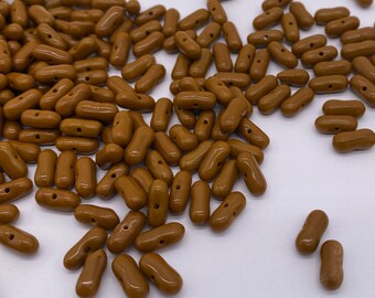 Small glass capsual spacer bead with mid center hole. Brown. 9mm ( 60 pieces per price)