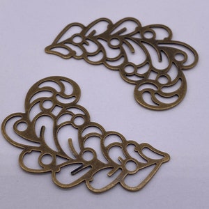 Brass floral/leaf finding. 36mm Length. ( 10 pieces per price)