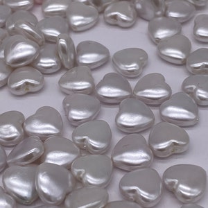 White Pearly heart bead. 9mm. Acrylic. ( 40 peices per price)