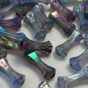 Blue iridescent bone shaped tube bead. (50 pieces per price)