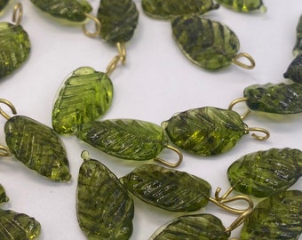 14mm glass leaf with fused brass eye pin. (Forest Green ) 25 pieces per price