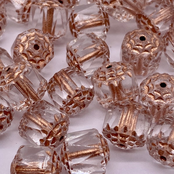 Facetted glass barrel bead. 8mm. Clear/Rose gold ( 30 peices per price)