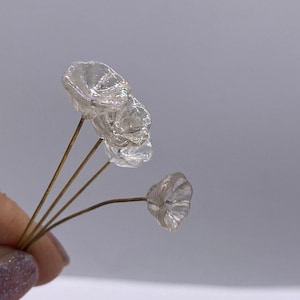 Hand made glass flowers with fused brass eye pin. 10mm. Crystal with AB coating. (20 pieces per price)