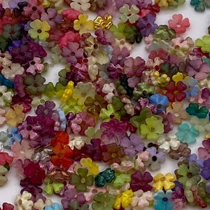 Mixed lot of hand painted tiny flower beads from Colleen Toland Beads. (200 pieces per price)