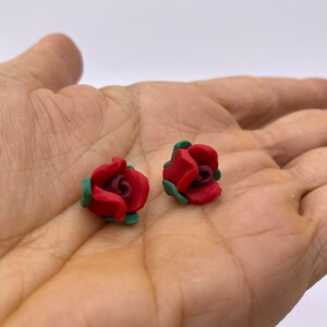 Hand made Polymer Clay Rose bud with a flat base and horizontal side holes. Red and Purple. 11mm. ( 10 pieces per price)