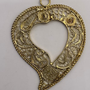 Filigree heart pendant from India. (2 pieces per price)
