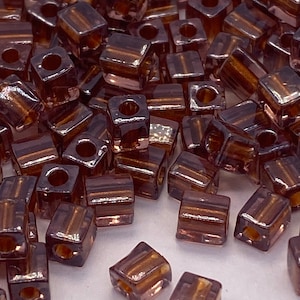 4mm Pinky Beige glass cube bead with AB coating (50 pieces per price)