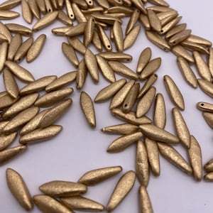 Mat etched glass spike/dagger beads. 16x5mm. Aztec Gold ( 40 pieces per price)