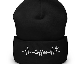 May include: Black beanie with a white embroidered design of a heartbeat with the word "Coffee" and a coffee cup with steam coming out of it.