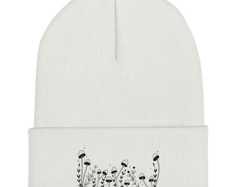 Gorro com punhos em formato de cogumelos