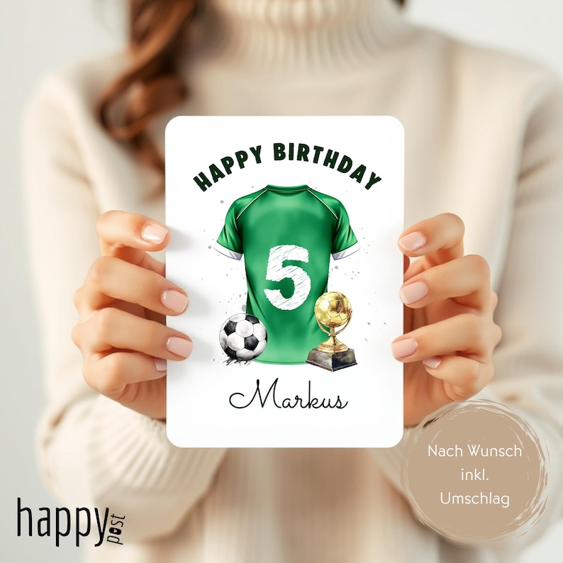 May include: A birthday card with a green soccer jersey design, featuring the number 5, a soccer ball, and a trophy. The words "HAPPY BIRTHDAY" are at the top, and the name "Markus" is written below the jersey.