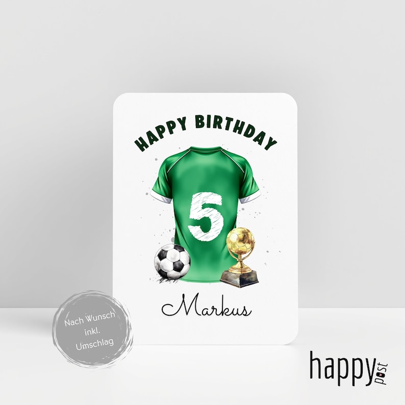 May include: A birthday card with a green soccer jersey graphic, featuring the number 5. The card includes a soccer ball, a trophy, and the words "Happy Birthday" and "Markus". The card has a white background.