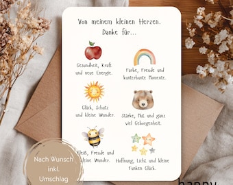 Op de afbeelding: Een wenskaart met Duitse tekst en illustraties van een appel, regenboog, zon, beer, bij en sterren. De kaart ligt op een bruine envelop. De tekst luidt "Von meinem kleinen Herzen. Danke für..."