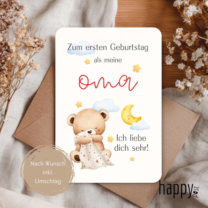 May include: A greeting card with a teddy bear illustration, clouds, stars, and a crescent moon. The card has text in German that says "Zum ersten Geburtstag als meine Oma. Ich liebe dich sehr!" and is placed on a brown envelope.